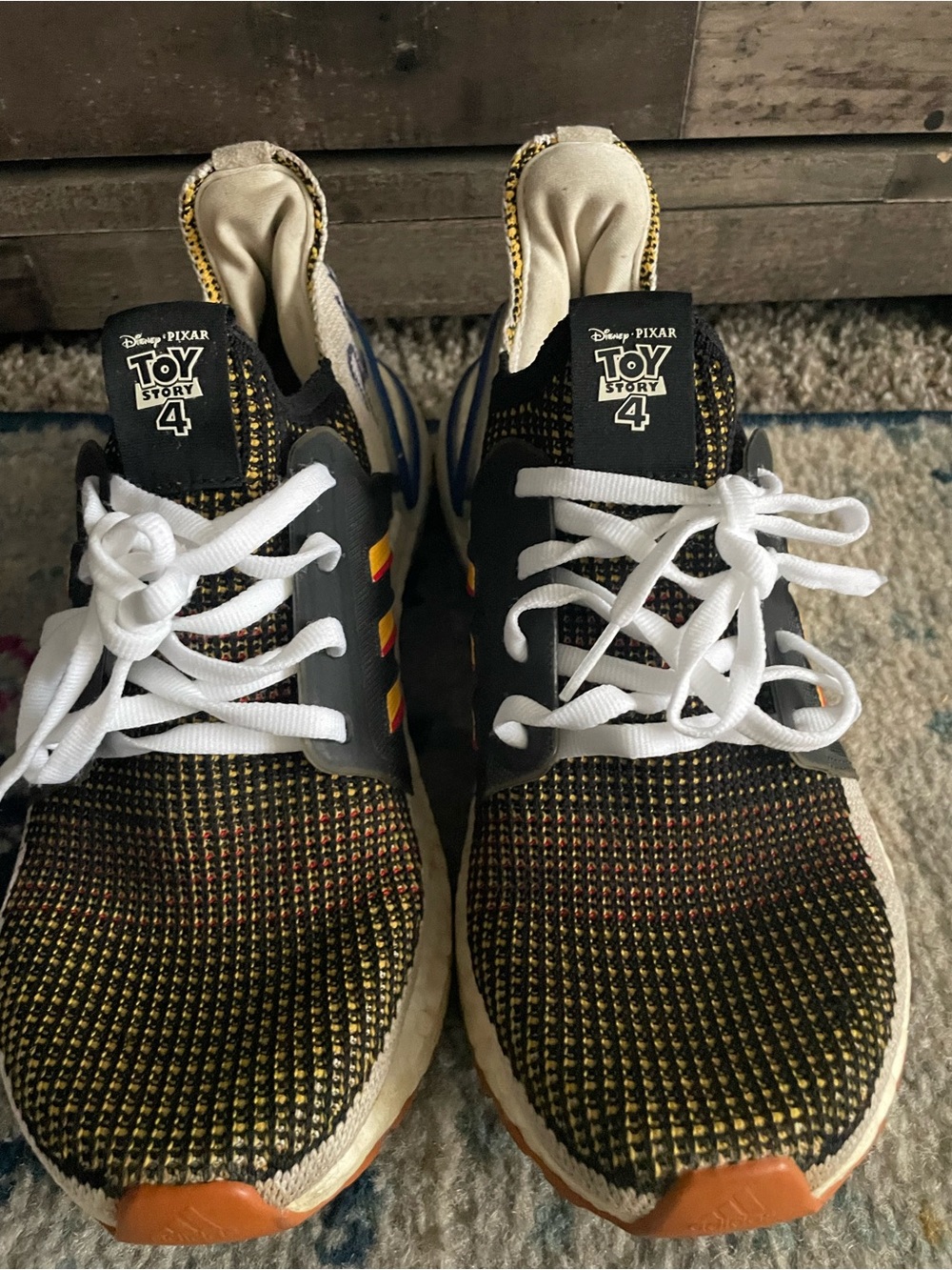 adidas Toy Story 4 Kids' Black and Yellow Knit Sneakers with Orange Toe